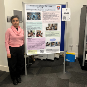 Dr. Dharini Balasubramaniam standing beside their poster