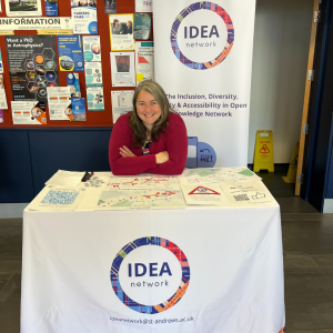 Kirsty Ross sitting at the IDEA network desk